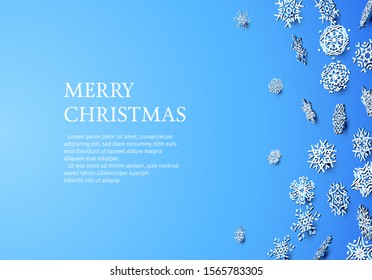 Christmas card with white snowflakes on blue background of frame with copy space for invitation or holiday greetings