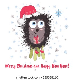 Christmas Card with a Winter Hedgehog with a Present.
