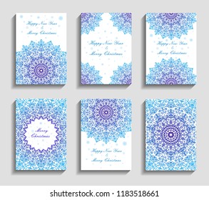 Christmas Cards with Mandala Snowflakes on Blue Background. Garlands from Christmas balls with beads. Intricate flourish design elements. 5 to 7 ratio. Oriental motif illustration for print.