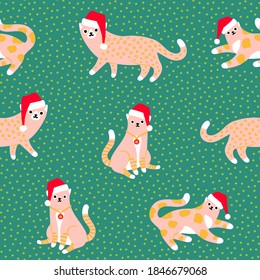 Christmas cats in Santa's hats seamless pattern. Funny cats in red hats on Christmas cats in Santa hats on green polka dot background Holiday illustration.