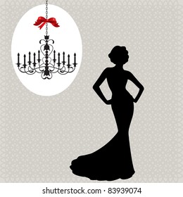 christmas chandelier  and glamour woman silhouette