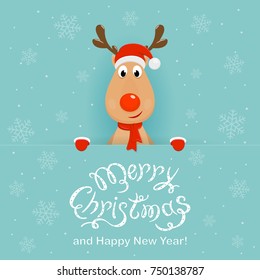 Christmas character deer behind a blue banner with lettering Merry Christmas and Happy New Year. Happy reindeer with red nose, hat of Santa and scarf, illustration.