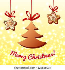 Christmas chocolate trees and gingerbreads on lights background