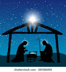 Christmas Christian nativity scene with baby Jesus in the manger in silhouette, and star of Bethlehem