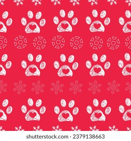 Christmas colored red background colored white paw prints and snowflakes seamless pattern