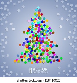 Christmas colorful confetti tree on the grey background with white snow