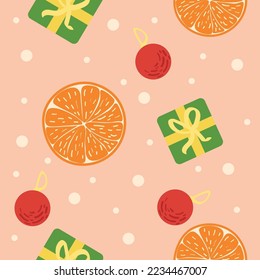 Composición navideña con cítricos, bolas y regalos sobre el color