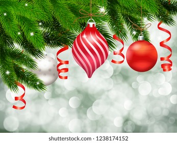 Christmas composition with decorations and fir needle of new year tree with blurry white particles background vector illustration