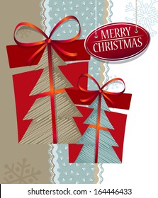 christmas composition with gift, bow, ribbon and christmas tree