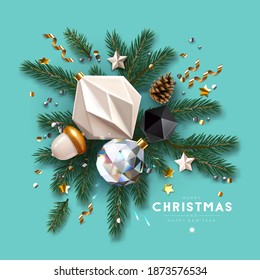 Christmas Composition made of pine branches, festive glass ornaments, confetti and serpentine on bright blue background. Top view. 