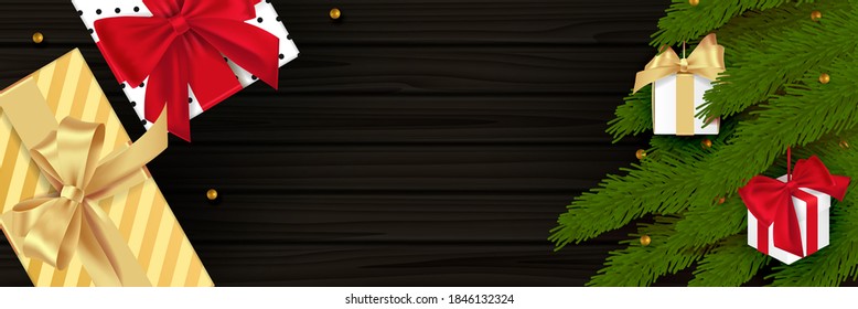 Christmas composition on wooden background. Xmas decoration design. Balck realistic Wood texture. Flat lay, top view.