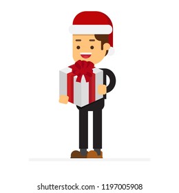 Christmas concept,Business man standing and holding a big gift box with red ribbon bow