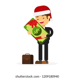 Christmas concept,businessman really happy enjoying and holding huge gift pack
