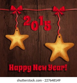 Christmas cookies in the shape of a star on the wooden background vector