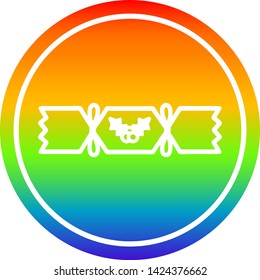 icono circular de cracker de navidad con acabado degradado de arco iris