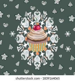 Christmas cupcake with cherry on the olive background with gingerbread patterns