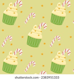 Christmas cupcake pattern. Muffin with cream, sprinkles and candy canes