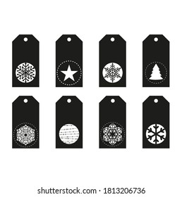 Christmas cut tags. Vector Snowflake silhouette gift labels. New Years gift tags. Holiday décor. 