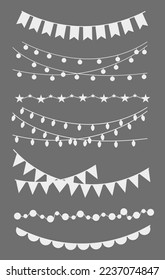 Christmas decoration elements hanging on an isolated background.
