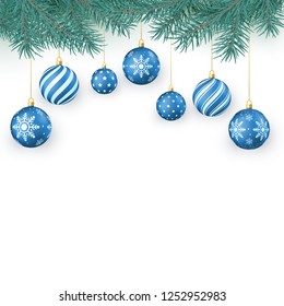 Christmas decoration elements isolated on white. Fir twigs and blue Christmas balls with snowflakes ornament. Xmas baubles. Vector illustration