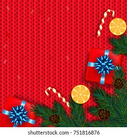 Christmas decoration with fir tree, gift, candy canes on red knitted background. Vector illustration