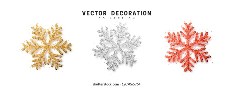 Christmas decoration, golden and silver and bright red glitter covered snowflake.