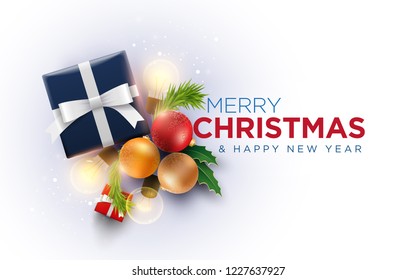 Christmas decoration objects and Christmas gift box with magical lights. Christmas and new year greeting and poster design. White background. 