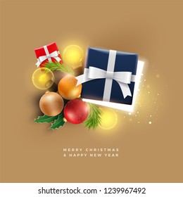 Christmas decoration objects. Half open Christmas gift box with magical lights on golden background. Christmas and new year greeting and poster design.  