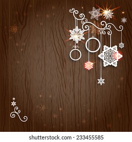 Christmas decoration on wood background with place for text.