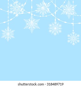 Christmas decoration with snowflakes on blue background
