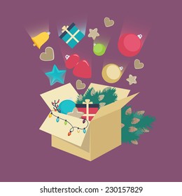 Christmas decorations falling into a box