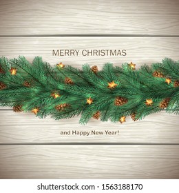 Christmas decorations with fir tree branches, stars and pine cones on white wooden background. Illustration with golden lettering can be used for holiday design, cards, invitations and banners.