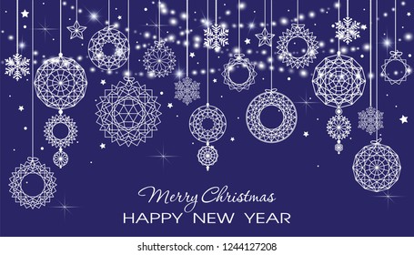 Christmas decorations, garlands, snowflakes and stars on dark blue background. New Year greeting card or invitation. Merry Christmas and Happy New Year.