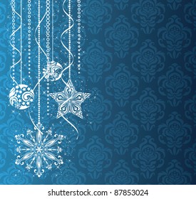 Christmas decorations on the blue wallpaper.