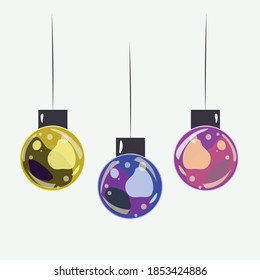 Christmas decorations on the Christmas tree. Three colorful balls for the Christmas tree