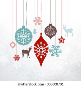 Christmas decorations, ornaments. Silver frosty background - frozen snowlfakes. Can be used as a greetings card.