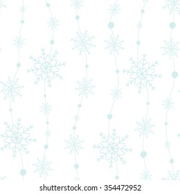 Christmas decorations for your design. Celebratory pattern with snowflakes hanging on strings. Seamless winter background.