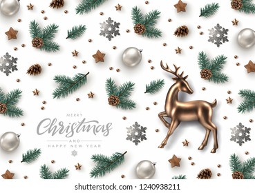 Christmas Decorative Background made of Pine Branches, Ornaments, Snowflakes, cookies and Gold Glass Deer. Flat lay, top view.