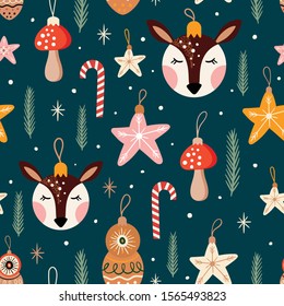 Christmas decorative seamless pattern with seasonal decorations, deer head, mushrooms and candies