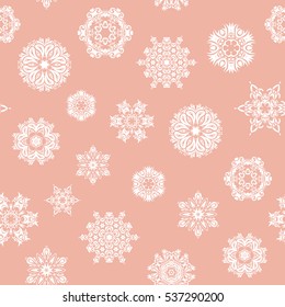 For the Christmas design and decoration. Vector seamless pattern with snowflakes, doodles and dots on pink background. Handmade drawing. Watercolor painting effect.