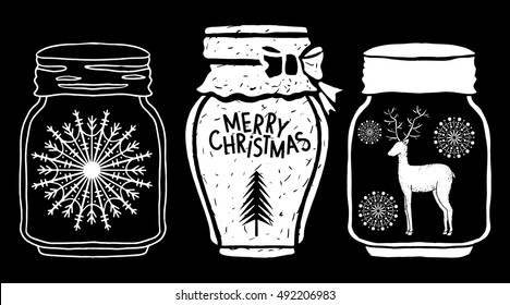 Christmas design elements set. Merry Christmas handwritten text. Jar with tree, snowflakes, reindeer hand drawn isolated on black background. Vector design