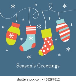 christmas design with hanging socks and gloves