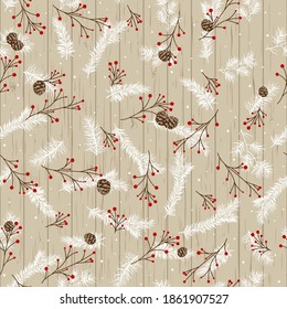 Christmas design with pine branches and cones on the background of wooden boards. Rowan branches with snowflakes. 