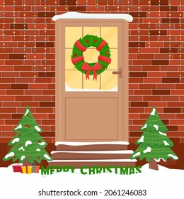 Christmas door with decorations. Winter front door
