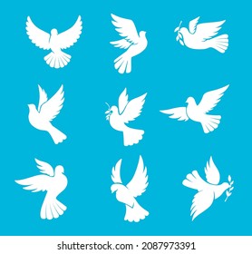 Christmas dove or wedding pigeon silhouettes, vector bird of peace and winter holiday. White dove with olive branch leaf, symbol of hope and freedom, wedding or Christmas greeting card icons