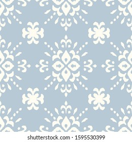 Christmas drawing with snowflakes. The Nordic style. Folk print with flakes. Scandinavian, Portuguese ornament. Spanish porcelain. Oriental damask. Ethnic motif. Ikat geometric folklore background. 