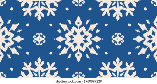 Christmas drawing with snowflakes. The Nordic style. Folk print with flakes. Scandinavian, Portuguese ornament. Spanish porcelain. Oriental damask. Ethnic motif. Ikat geometric folklore background. 