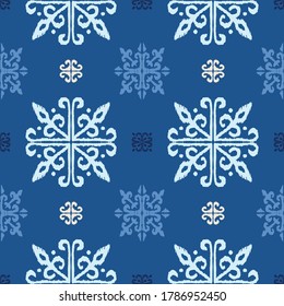 Christmas drawing with snowflakes. The Nordic style. Folk print with flakes. Scandinavian, Portuguese ornament. Spanish porcelain. Oriental damask. Ethnic motif. Ikat geometric folklore background. 