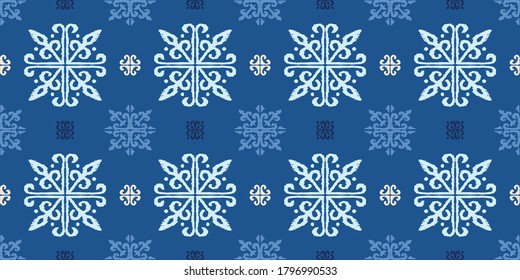 Christmas drawing with snowflakes. The Nordic style. Folk print with flakes. Scandinavian, Portuguese ornament. Spanish porcelain. Oriental damask. Ethnic motif. Ikat geometric folklore background. 