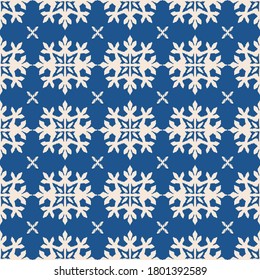 Christmas drawing with snowflakes. The Nordic style. Folk print with flakes. Scandinavian, Portuguese ornament. Spanish porcelain. Oriental damask. Ethnic motif. Ikat geometric folklore background. 